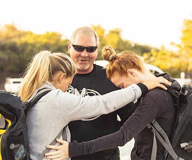 Crew praying together