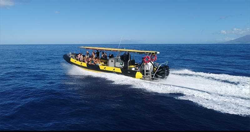 No Ka Oi boat running fast in the water