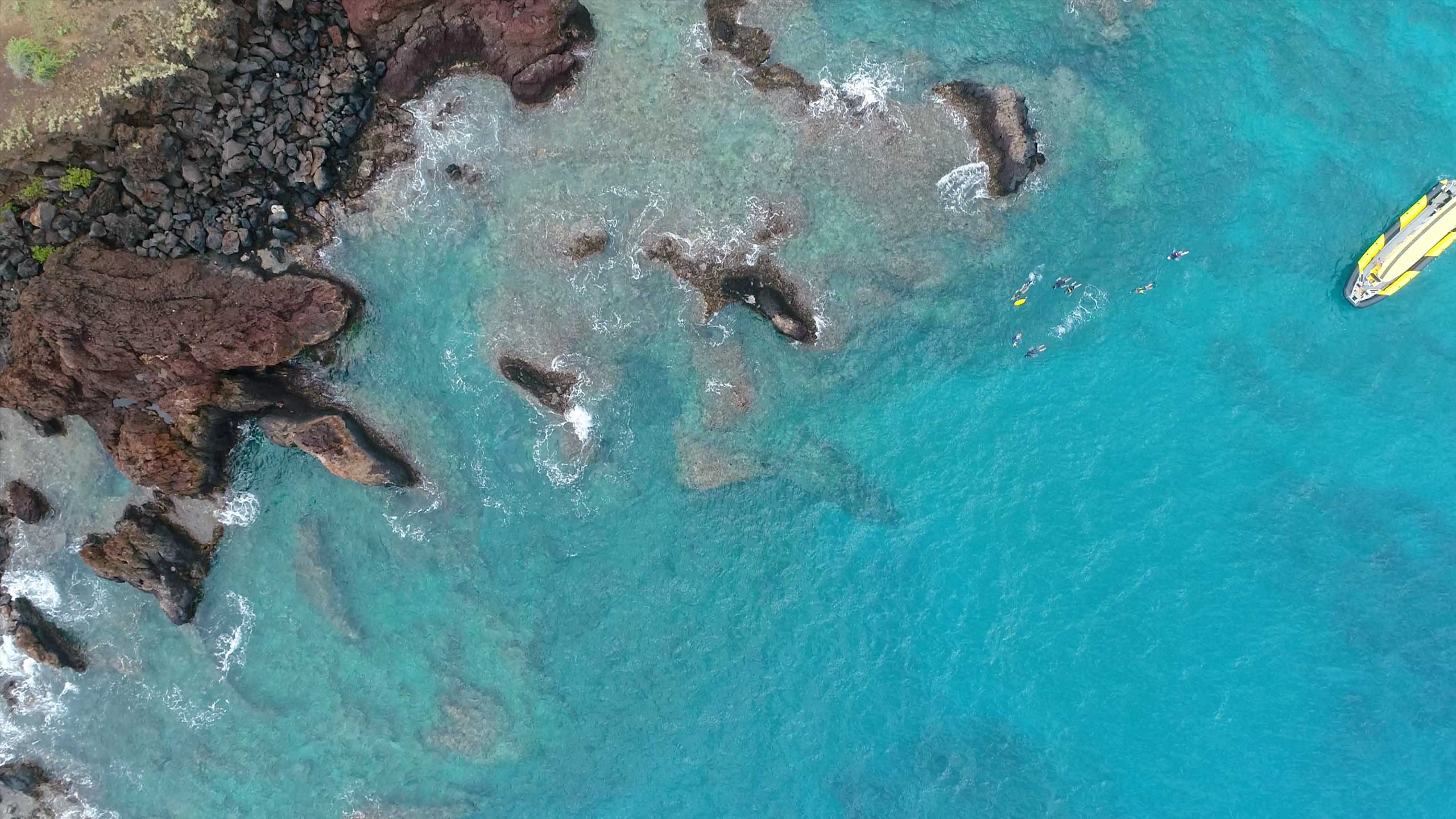 arial shot looking directly down on the boat in the water